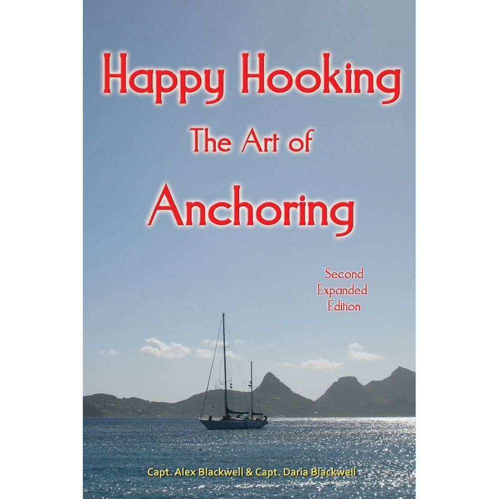 Book cover of "Happy Hooking" by White Seahorse shows a sailboat anchored in calm water with mountainous islands and a blue sky, highlighting boat anchoring. Second expanded edition. Authors: Alex and Daria Blackwell.