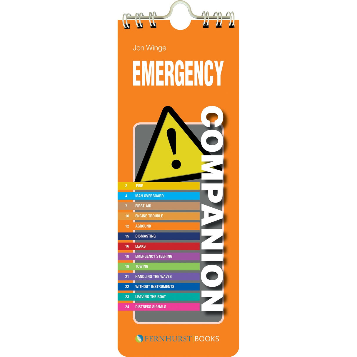 The "Emergency Companion" by Fernhurst Books is a bright orange spiral-bound booklet featuring a yellow warning triangle and a numbered list of boating first aid and maritime safety topics on the cover.