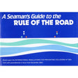 The cover of "A Seaman's Guide to the Rule of the Road" by Morgans Technical Books showcases abstract waves and navigational lights, emphasizing its basis on COLREGs. Updates from November 2003 make it an essential resource for those preparing for Yachtmaster exams.