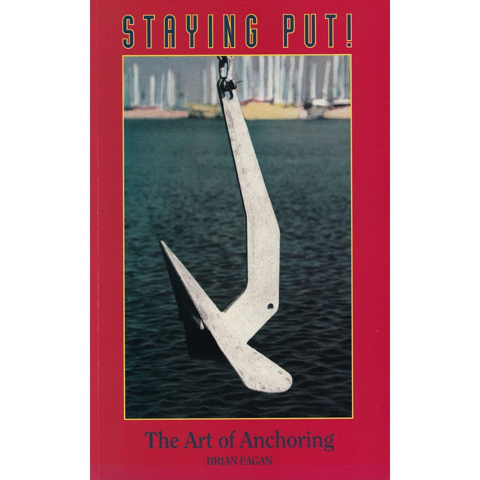 Book cover for "Staying Put!" by Fernhurst Books, showing a close-up of a metal anchor with water and sailboats in the background, framed by a red border—ideal for seamanship and anchoring enthusiasts.