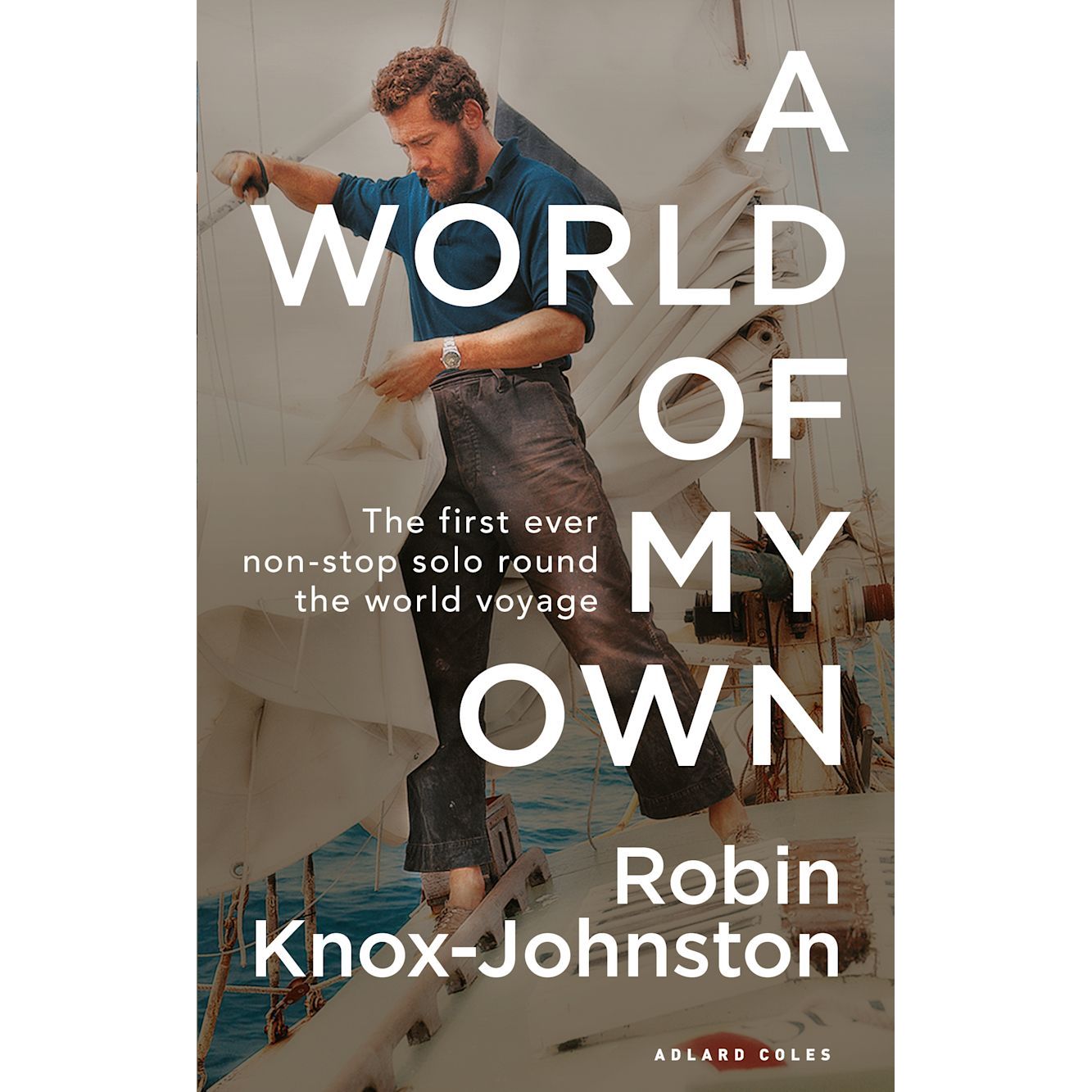 Cover of "A World of My Own" by Robin Knox-Johnston features a man adjusting boat sails, highlighting the first non-stop solo circumnavigation, published by Adlard Coles.