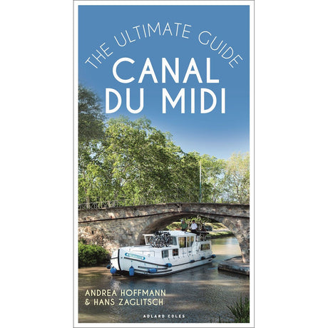 Cover of "Canal du Midi" by Andrea Hoffmann & Hans Zaglitsch features a scenic boat under a stone bridge on the UNESCO World Heritage canal, bordered by lush trees. Published by Adlard Coles, it's ideal for boating holiday planners.