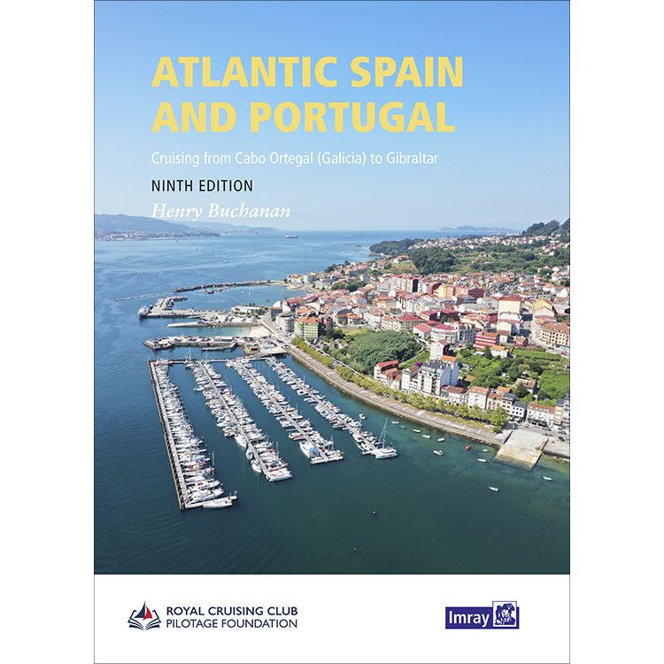 Book cover for "Atlantic Spain and Portugal" by Imray, showing an aerial view of a marina on the Iberian coast, with a town, green hills, water, blue sky, and RCCPF and Imray logos at the bottom.