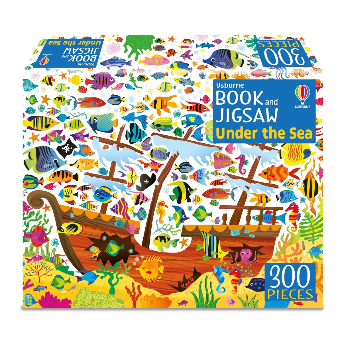 The Usborne Under the Sea Book and Jigsaw is a 300-piece puzzle featuring a vibrant underwater scene with a sunken wooden ship, colorful fish, seaweed, coral, and bubbles—ideal for fun ocean-themed learning.