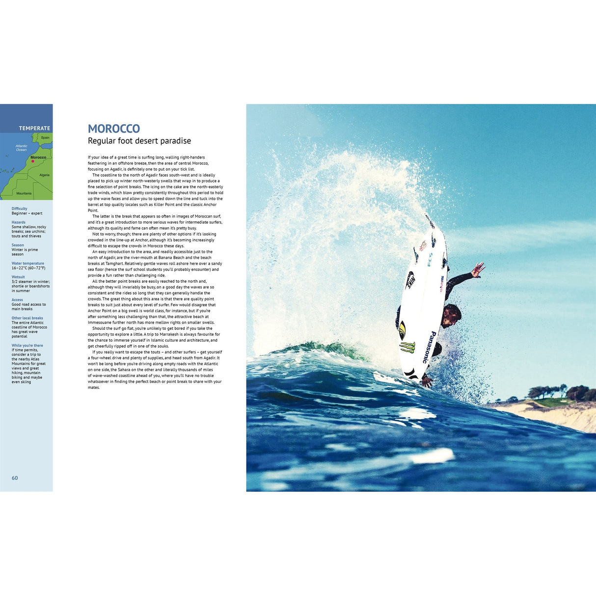 Experience the thrill of surf travel with Ultimate Surfing Adventures by Fernhurst Books—a surfer rides a vertical wave near the crest on a sunny day, with sandy shores and greenery in the backdrop.