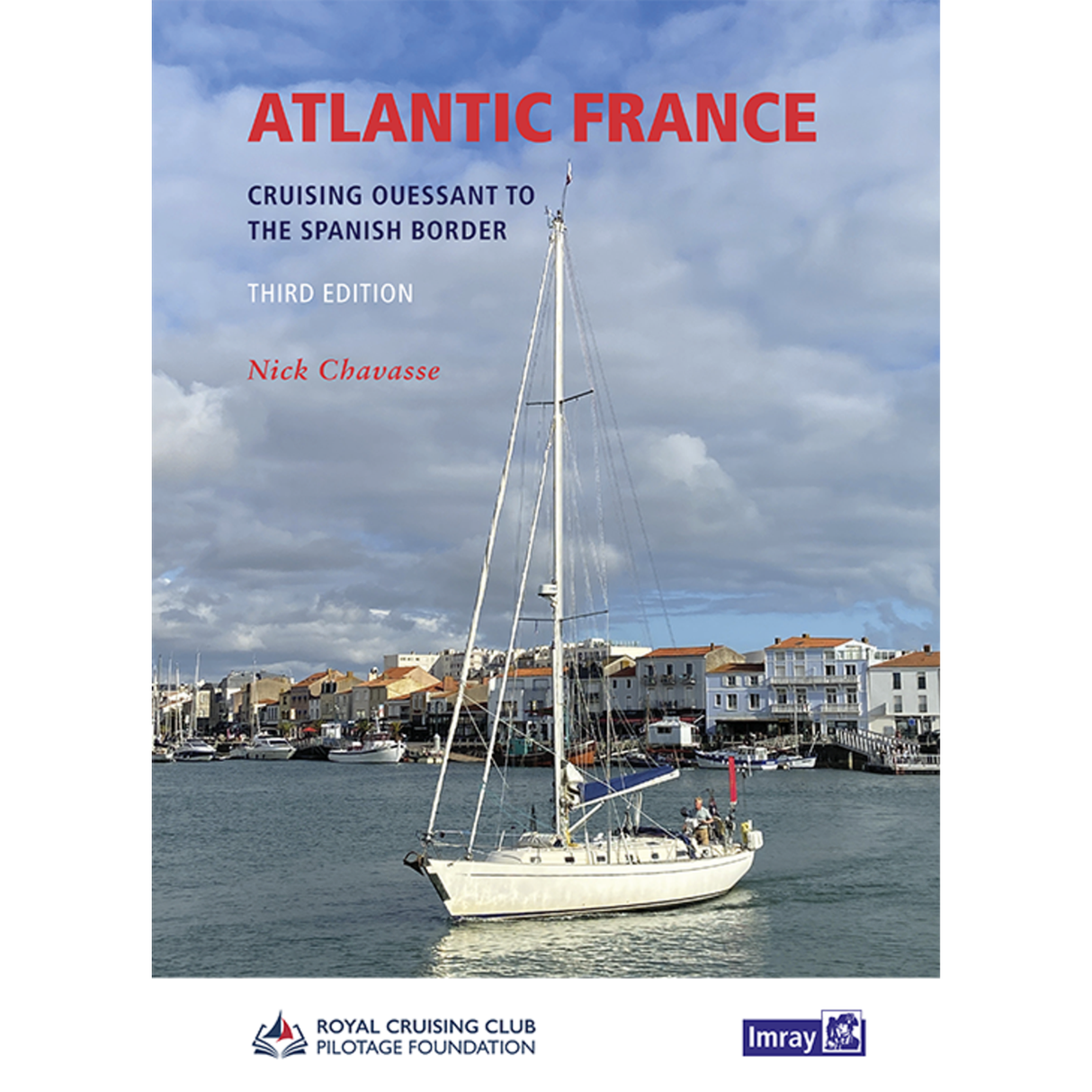 Cover of the book titled "Atlantic France" by Nick Chavasse, Third Edition. The cover art captures a sailboat gliding through serene harbor waters with picturesque coastal buildings in the background, embodying the spirit of an authentic sailing adventure. Published by Imray and the Royal Cruising Club Pilotage Foundation.