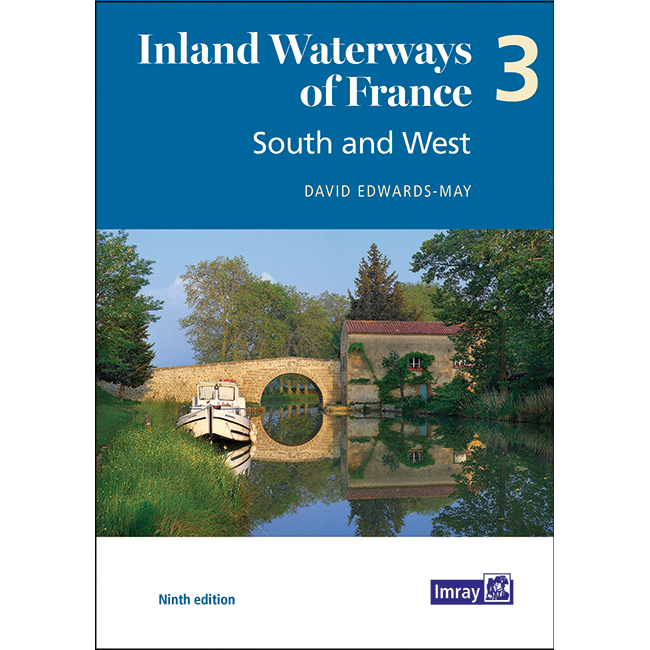 Cover of Imray's "Inland Waterways of France Volume 3: South and West" by David Edwards-May, depicting a peaceful canal scene with a stone bridge, lush trees, and docked boat.