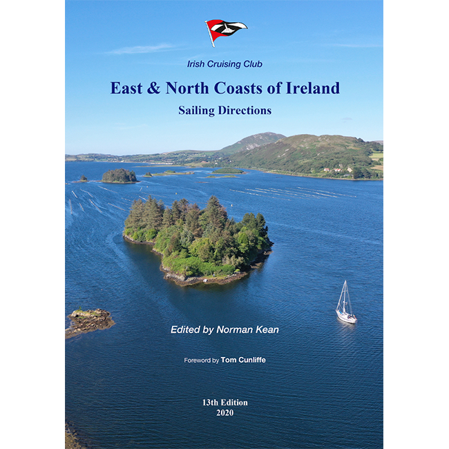 The cover of the 13th edition (2020) of "East & North Coasts of Ireland" by the Irish Cruising Club, edited by Norman Kean, features an island with blue waters and hills. It provides sailing directions and passage planning advice.