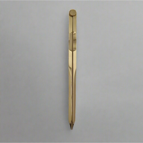 A sleek, Chartwright 8" Straight Brass Divider, reminiscent of a precision instrument, is centered against a plain, light gray background. The divider has a reflective surface and adjustable legs near its top for precise measurements and drawing.