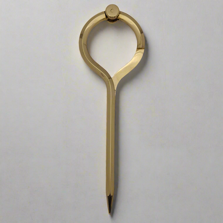 The Chartwright 8" Single-Handed Brass Dividers, crafted from brass with a sleek, modern design, are shown against a plain white background. This elegant navigation tool features a circular top and a single pointed leg, offering a minimalist appearance reminiscent of traditional brass dividers used in chartwork.