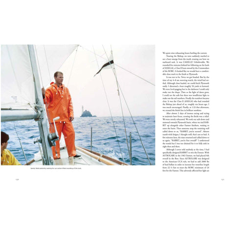 A person in an orange raincoat embodies the innovation of yacht design on the sailboat deck, featured in "Dick Carter: Yacht Designer" by Fernhurst Books. They gaze at the ocean and a distant lighthouse; two others are partially visible onboard, adding to the contemplative mood.