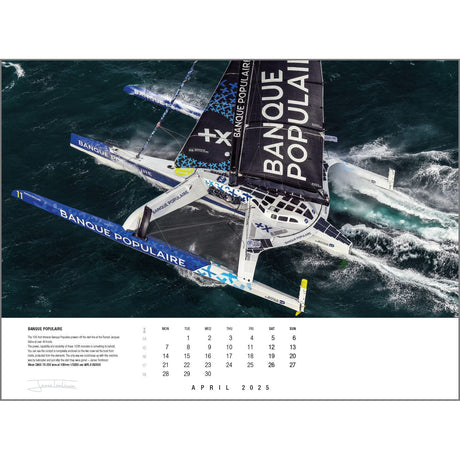 A breathtaking aerial shot of the Banque Populaire sailing trimaran cutting through rough waters is highlighted for April in the Rick Tomlinson Portfolio Calendar 2025 by Rick Tomlinson Photography. The photograph features a concise description in the lower left and a date grid beneath, exemplifying remarkable sailing photography.