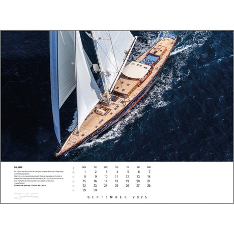 Witness the breathtaking aerial view of the majestic sailing yacht "SY Anne," its pristine white sails and wooden deck elegantly commanding the deep blue ocean. This captivating image, taken by renowned photographer Rick Tomlinson, is showcased in the September edition of the Rick Tomlinson Photography's 2025 Portfolio Calendar.