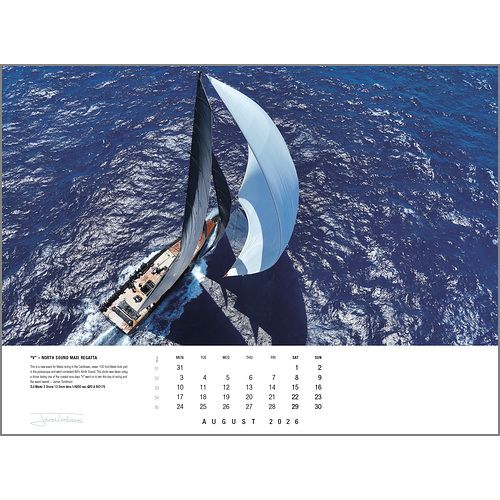 Aerial view of a sailboat with billowing sails gliding over deep blue water under a clear sky. Dates and text appear at the bottom of the Rick Tomlinson Portfolio Calendar 2026 by Rick Tomlinson Photography.