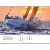 A sailboat races through sunset waves in this striking sailing photo featured for September in the Rick Tomlinson Portfolio Calendar 2026 by Rick Tomlinson Photography.