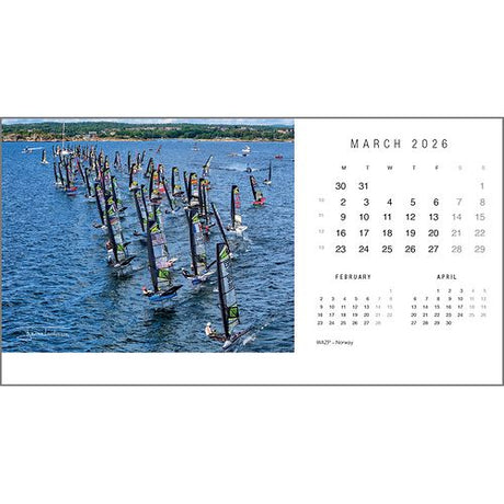 A Rick Tomlinson desk calendar for 2026 by Rick Tomlinson Photography features a photo of many small sailboats racing on blue water. The highlighted March location is WP47 in Norway, with February and April calendars shown below.