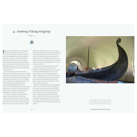 The exhibit features a large, ancient Viking longship with a dragon-shaped prow in a modern, arched room. It is accompanied by the "A History of Sailing in 100 Objects" by Adlard Coles, providing insights into Viking maritime technology and sailing history.