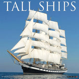 A majestic tall ship with white sails unfurled glides across a calm blue sea under a clear sky on the cover of the Willow Creek Press "Tall Ships 2025 Calendar," an 18-month wall calendar celebrating maritime history.