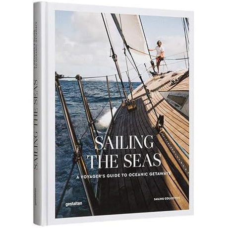 Cover of "Sailing the Seas" by gestalten: A person steers a sailboat on open waters with sunlight illuminating the wooden deck and waves in the background, inviting exploration of nautical adventures.