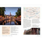 Experience canal views in Groningen at dusk with the illuminated Martini Tower, train station architecture, and city map imagery—ideal inspiration for your Netherlands sailing journey with the Adlard Coles Shore Guide: The Netherlands by Adlard Coles.