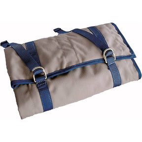 The Weems & Plath NaviTote is a durable rolled-up canvas tool bag with blue straps and metal D-rings, perfect for storing navigation tools.