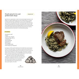 A Year on the River by Adlard Coles features a plate of Greek spinach rice with grilled lamb chop and lemon on a red-edged dish, offering ideal seasonal boat recipe inspiration, plus an illustration of stacked stones at the page bottom.