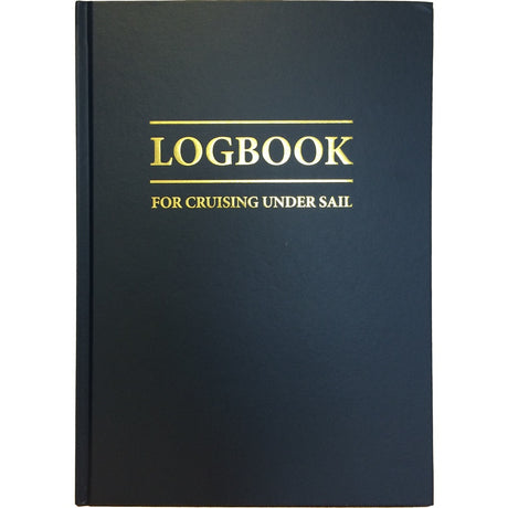 The "Logbook For Cruising Under Sail" by Fernhurst Books is a dark blue hardcover navigation logbook with gold-embossed title on the front cover.