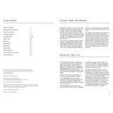 A spread from Fernhurst Books' "Logbook For Cruising Under Sail" shows the table of contents opposite text pages titled "USING THE LOGBOOK" and "KEEPING THE LOG," with a clean, navigation logbook-style layout—black text on white.