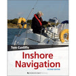 The cover of "Inshore Navigation" by Fernhurst Books shows a person steering a sailboat, with water, trees, and safety gear visible—illustrating this beginner's guide to marine navigation.