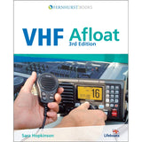 The cover of Fernhurst Books’ "VHF Afloat" shows a hand with a VHF DSC radio mic in front of a marine radio set to channel 16, and a boat control panel in the background.