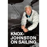 Book cover for "Knox-Johnston on Sailing" by Fernhurst Books shows the famous skipper with white hair steering a sailboat, with a Libby Purves quote over a sea and sails backdrop.