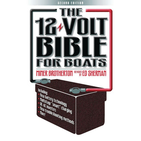 Reeds' "The 12 Volt Bible for Boats" book cover showcases bold text and cable graphics, highlighting 12-volt electrical systems, boat electrics basics, battery technology, and troubleshooting methods.