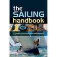 Cover of "The Sailing Handbook" by Adlard Coles, featuring a sailboat, compass, ropes, and winch. This essential guide for beginners includes a vibrant image of people navigating ocean waves.