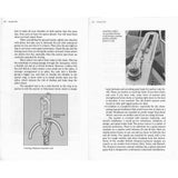 Staying Put! by Fernhurst Books shows a spread on seamanship and sailor knots. The right page features a black-and-white photo of a chain stopper device in use—a helpful anchoring reference.