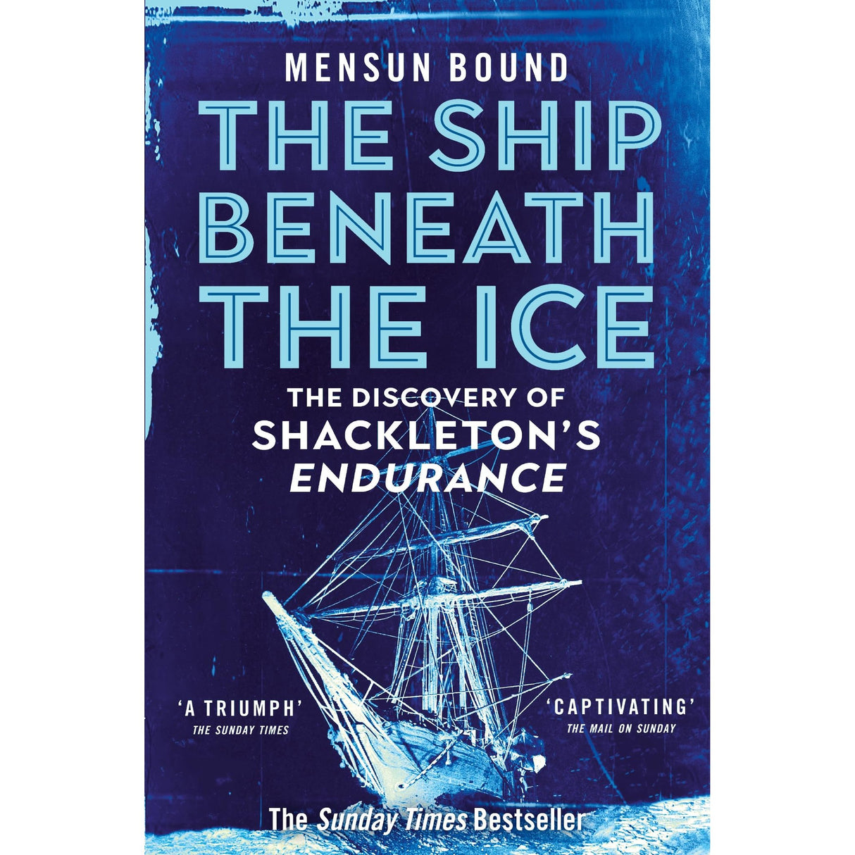 Book cover for "The Ship Beneath the Ice" by Pan Books, showing the Endurance trapped in ice against a blue background, with text about the discovery of Shackleton’s Antarctic shipwreck.