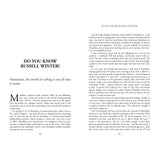 Open book spread from "Amazing Surfing Stories" by Fernhurst Books featuring an article titled "DO YOU KNOW RUSSELL WINTER?"—surfing tales from Mundaka, Spain, legendary surfers, and monster waves; two text-only pages.