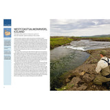 An angler stands by a wide river in Iceland, surrounded by green hills and cloudy skies. Text about Ultimate Fishing Adventures by Fernhurst Books appears on the left, highlighting West Coast Salmon Rivers and unforgettable fishing experiences.