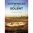 Book cover for "Shipwrecks of the Solent" from Amberley Publishing, showcasing a grounded, decaying shipwreck on muddy terrain surrounded by green vegetation under a blue sky, capturing the dramatic maritime history and shipwreck disasters of the Solent and Portsmouth.