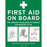 Adlard Coles’ "First Aid On Board" features a medical cross and step-by-step first aid illustrations—a must-have visual guide for handling medical emergencies at sea.
