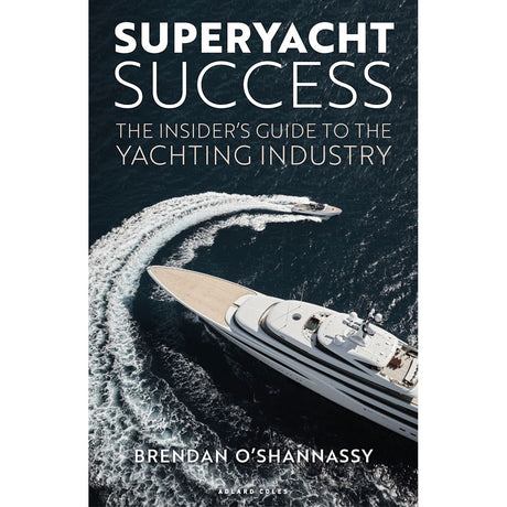 Aerial view of a white superyacht cruising deep blue water, leaving a wake. Overlaid text: "Superyacht Success" by Brendan O'Shannassy, from Adlard Coles.