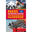 Cover of "Reeds Outboard Motor Troubleshooting Handbook" by Reeds. Showcases images of outboard motors: a top view with three motors, someone handling a red part, and a close-up of one motor. Text: "Handy Pocket Guide for the Skipper's DIY Toolkit.