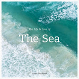 A breathtaking aerial image of turquoise ocean waves meeting a sandy shore, overlaid with the text "The Life and Love of the Sea" and "Lewis Blackwell" in white—a captivating piece from Abrams Books that perfectly encapsulates the beauty of extraordinary ocean photography.