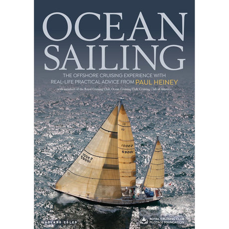 Cover of "Ocean Sailing" by Adlard Coles shows a sailboat with beige sails on a calm ocean under clear skies, ideal for offshore cruising. The title is at the top, highlighting the book's practical advice and contributors.