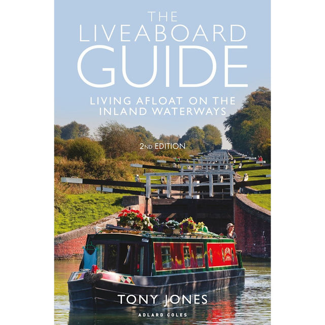 Cover of "The Liveaboard Guide" by Adlard Coles. Illustrates a narrowboat navigating serene inland waterways, flanked by lush greenery, with a series of locks rising in the background under a clear blue sky.