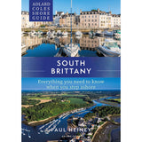 Cover of "Adlard Coles Shore Guide: South Brittany" by Paul Heiney, showing a marina with boats and historic buildings above, and an aerial river view with greenery and houses below. Text: "Everything you need to know when you step ashore for your sailing adventures." Brand: Adlard Coles.