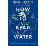 The cover of "How To Read Water" by Sceptre displays stylized waves, raindrops, fish, and a boat on a deep blue background, highlighting the book’s theme of natural navigation and uncovering water’s hidden clues.