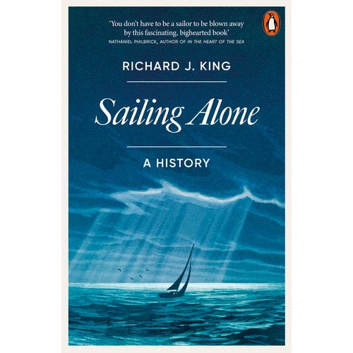 Cover of "Sailing Alone" by Penguin Books. Depicts a sailboat solo sailing on the ocean beneath a dramatic sky, with sunbeams breaking through clouds and an endorsement at the top.