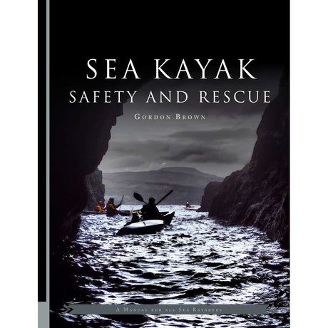 The cover of "Sea Kayak Safety and Rescue" by Pesda Press depicts kayakers navigating waters between dark coastal cliffs under a cloudy sky, reflecting the book’s focus on sea kayak safety and effective kayaking rescue techniques.