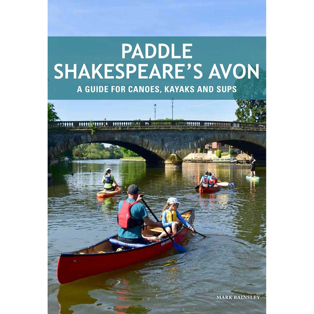 Canoeists, kayakers, and paddleboarders enjoy a tranquil stretch of the river beneath a stone arch bridge, surrounded by lush trees and scenic buildings. The cover of "Paddle Shakespeare's Avon" by Pesda Press features the subtitle: "A guide for canoes, kayaks and SUPs – your essential River Avon paddling guide.