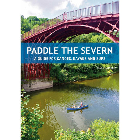 A vibrant scene of a blue canoe carrying two paddlers down a green river beneath a striking red iron bridge, all framed by lush forest, adorns the cover of "Paddle the Severn" from Pesda Press—a comprehensive guidebook featuring scenic paddling routes along the River Severn.